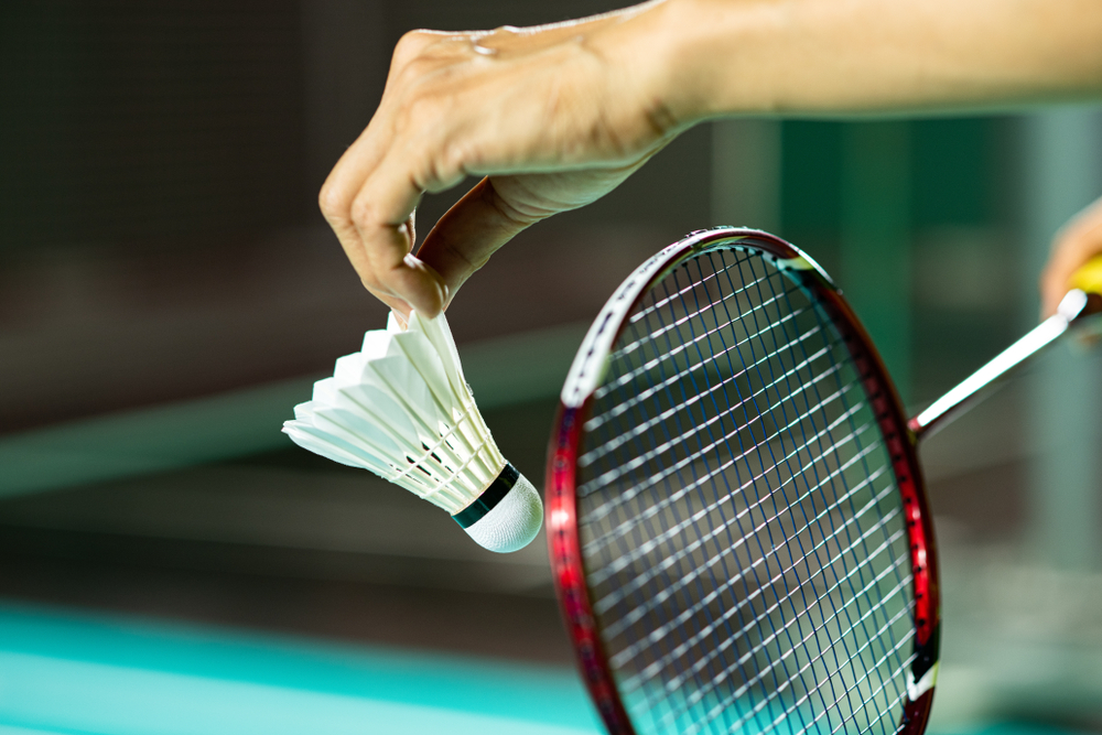 badminton player serving